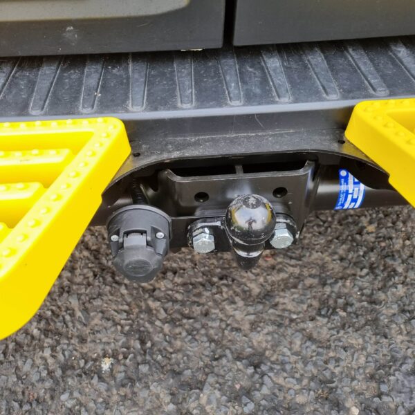 Tow bar on the back of the rugged welfare van